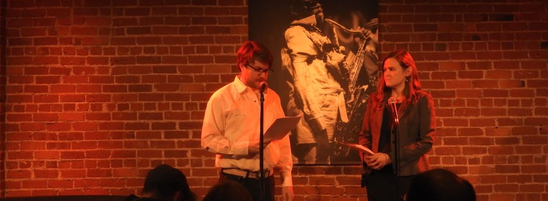 Ryan Alpers and Julia Halprin Jackson read the prologue to "The End of Time" by Cellista at Cafe Strtich, January 6, 2016. Photo by Leo Alvarez.