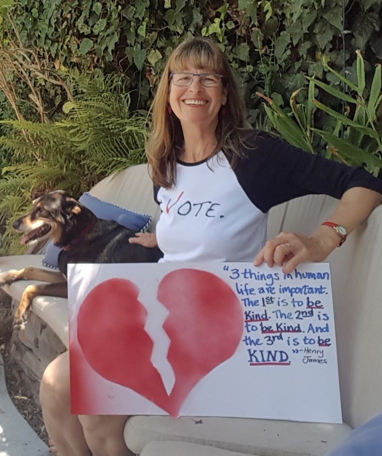 8-2017 AHW with BE KIND sign after rally in solidarity with Charlottesville 8-2017