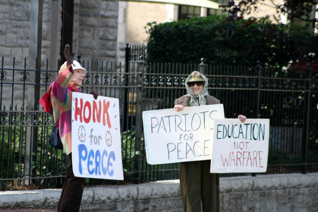 stock-photo-education-peace-protest-activism-no-war-03e0d4bb-590f-44c3-a83d-ddab63b430bd